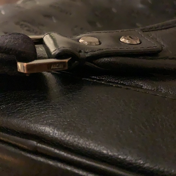 Authentic MCM embossed Black Calfskin backpack